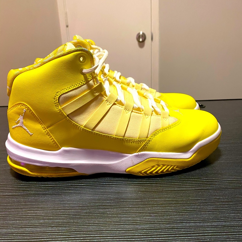 Jordan limited edition canary yellow hi tops.